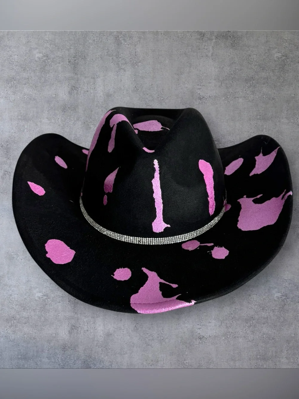 Black Cowboy Hat with Pink Accents and Star Embellishments